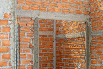 The walls of buildings are made of cement and mortar. Most buildings use cement.