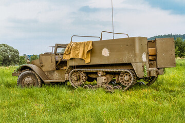 The M5 half-track (officially the Carrier, Personnel, Half-track, M5)  American armored personnel carrier in use during World War II. Reconnaissance and transport vehicle