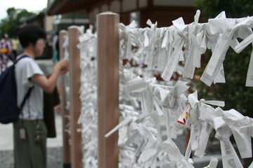 prayers in shrine, japan 