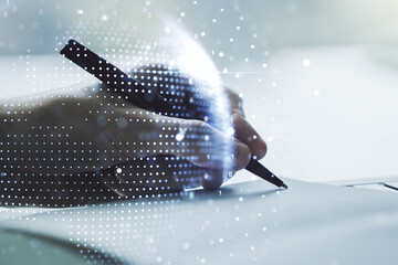 Abstract creative digital world map and man hand writing in diary on background, globalization...