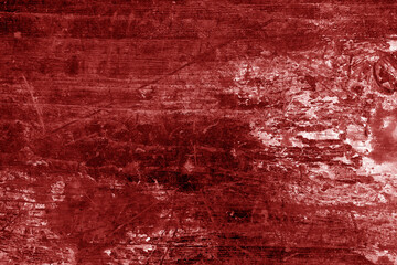 Old rusted and stained floor pattern in red tone.