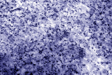 Fototapeta na wymiar Granite surface as background with blur effect in blue tone.