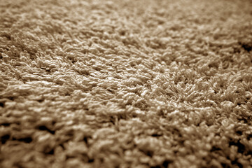 Bath towel texture with blur effect in brown color.