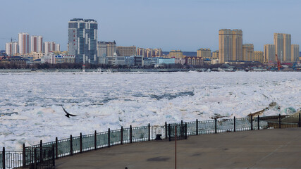 Ice drift. River Amur. Heihe Chinese city.