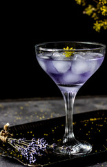 Lavander coctail on dark and moody background.