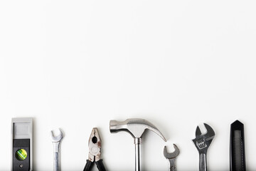 All tools supplies home construction on the white table background Isolated. Building tool repair equipments.
