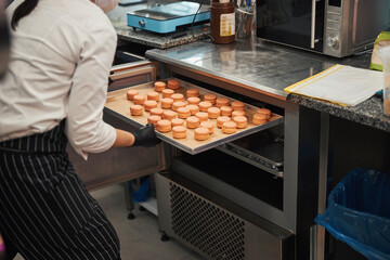 Professional pastry chef in charge of baking delicious macarons