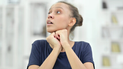 Portrait of Young African Woman Getting Scared