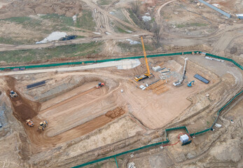 Vibration road roller and wheel loader leveling ground for construct of foundation. Soil Compactor...