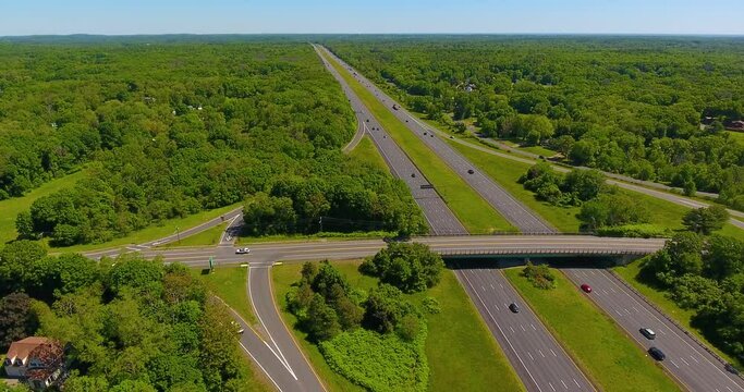 Aerial view of Interstate Highway 95 northbound at exit 81 with Central Street intersection in summer in town of Newbury, Massachusetts MA, USA. 
