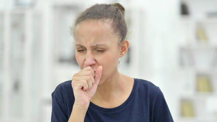 Fototapeta na wymiar Portrait of Sick African Woman Coughing