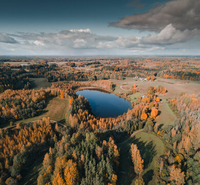 Aerial view of Sibulaj&auml;rv lake with dramatic clouds in fall season, Karula National Park, V&otilde;rumaa, Estonia.