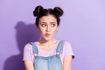 Photo of young attractive girl worried nervous fail mistake look empty space isolated over purple...