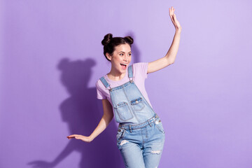 Photo of young attractive girl happy positive smile excited have fun look empty space isolated over...