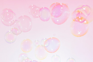 Beautiful Transparent Pink soap Bubbles Float Background.