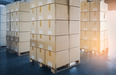 Stacked of Package Boxes on Wooden Pallet at Storage Warehouse.  Shipment Boxes. Cargo Export- Import.