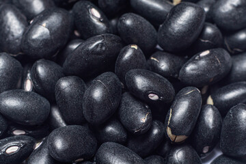 Black beans macro photo close-up top view. Legumes are a source of protein, vegetarian foods