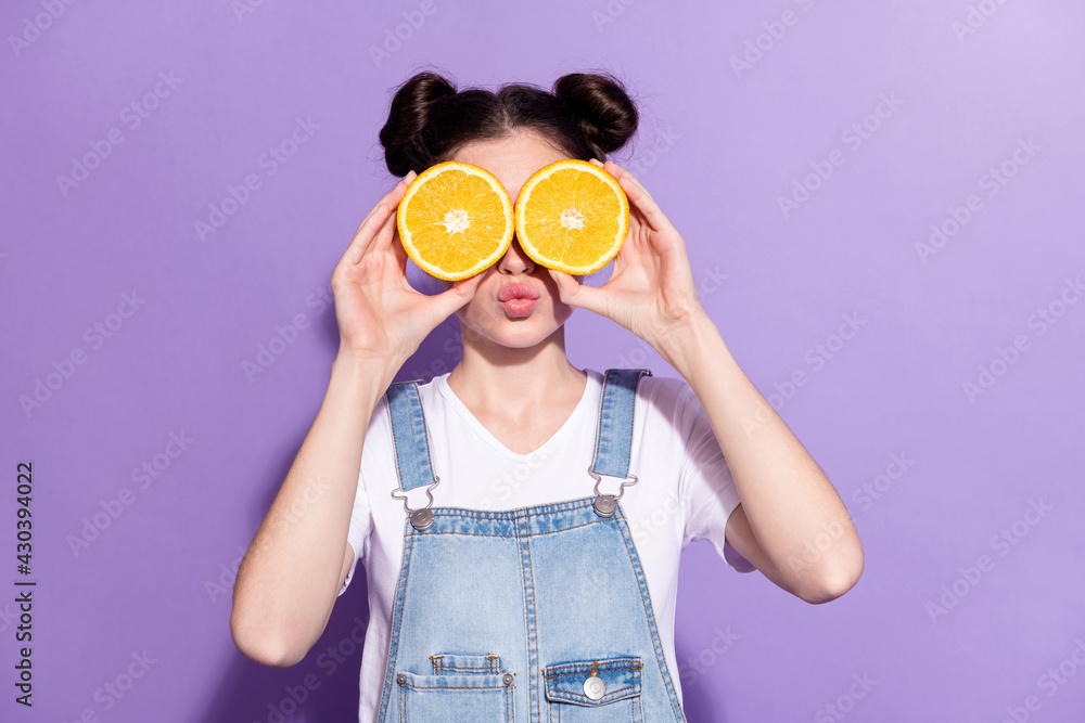 Sticker Photo of funny brown hair lady cover eyes oranges wear t-shirt overall isolated on violet background