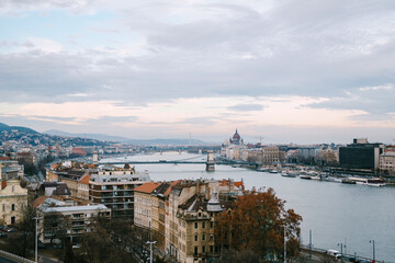 Fototapeta na wymiar Panoramic view of old buildings on the embankment in Budapest against the background of the sky