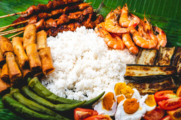 Boodle Fight- White Rice, Lumpiang Shanghai, Salted Egg, Tomato, Boiled Okra, Fried Eggplant,...