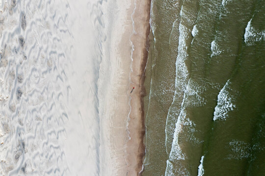 Aerial view of wild Baltic sea coast beach landscape in Curonian Spit near Klaipeda, Lithuania.