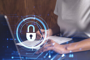 A businesswoman in casual wear signing the contract to prevent probability of risks in cyber...