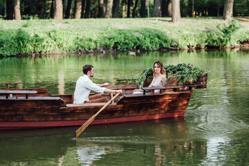a boat trip for a guy and a girl along the canals and bays of the river