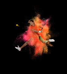 One tennis player in explosion of colored neon powder isolated on black background