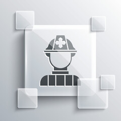 Grey Firefighter icon isolated on grey background. Square glass panels. Vector