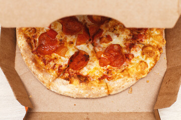 pizza in cardboard box. fast food delivery concept