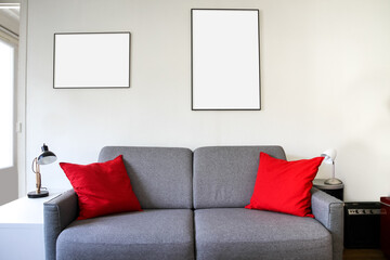 Blank picture frame on a sofa