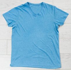 Blue t-shirt mock up top view, blue shirt copy space