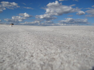 floor of salt and sky with clouds