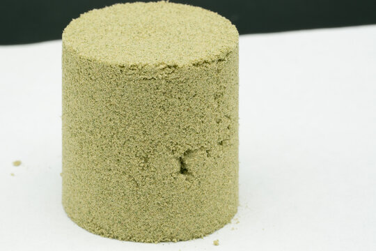 Kief, or dry sift hash, slightly compressed for form a cylinder shape 