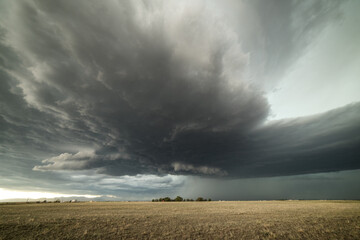 USA, Colorado, Colorado Springs, Tornadic storm clouds over plain