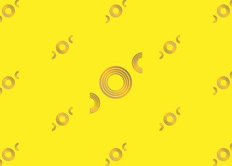 Gold rings on a yellow background.