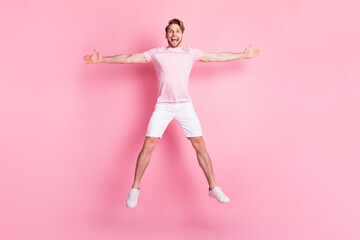 Full size portrait of satisfied sportive person make star figure open mouth smile isolated on pink...
