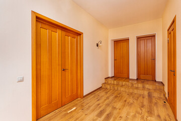 Fototapeta premium bright entrance hall with rooms and stairs