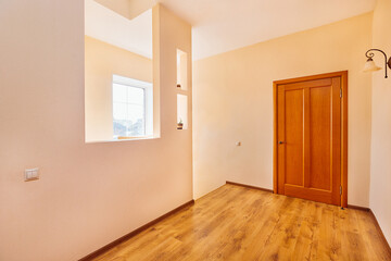 bright entrance hall with rooms and stairs