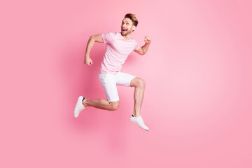 Fototapeta na wymiar Full size profile photo of carefree astonished person look empty space open mouth isolated on pink color background