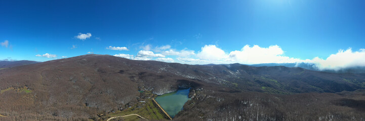 180 degrees virtual reality panorama of Maulazzo lake immersed in the beautiful beech forest of Monte Soro in winter on the Nebrodi, Sicily, Italy.