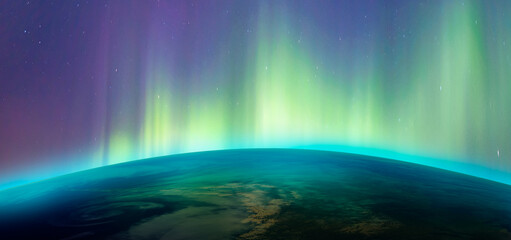 Northern lights aurora borealis over planet Earth 