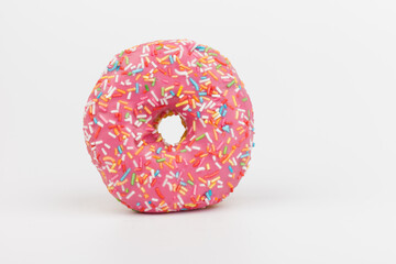 Fresh made Donuts isolated on white background. Doughnuts are traditional sweet pastries. Copy space for text.