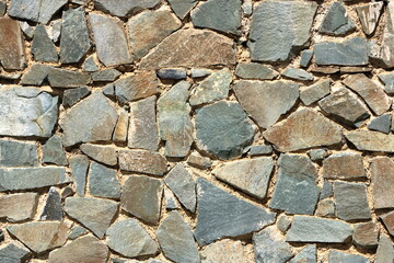 Background of decorate green stone wall surface