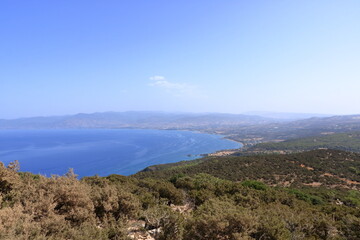 Looking across a campsite towards Latchi and Polis and the Troodos Mountains, Akamas Peninsula, Cyprus.