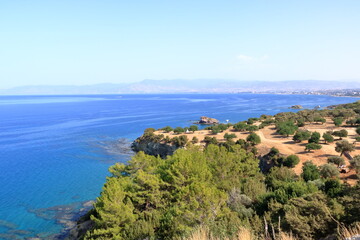 Looking across a campsite towards Latchi and Polis and the Troodos Mountains, Akamas Peninsula,...
