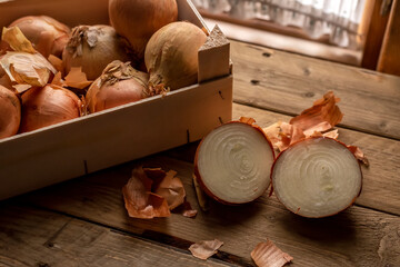 Onions on rustic wood.