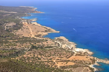 Schilderijen op glas View from above to the Cyprus island sea coast with blue lagoon. Akamas cape landscape © Dynamoland
