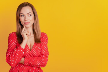 Close-up photo of intelligent girl finger chin look empty space think on yellow background