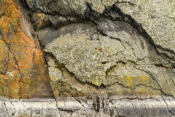rock wall texture over water with different surfaces and old water level